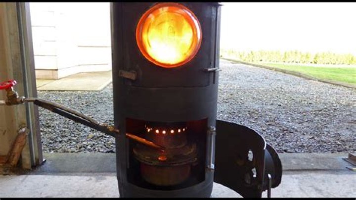 Can I burn waste oil in my wood stove?