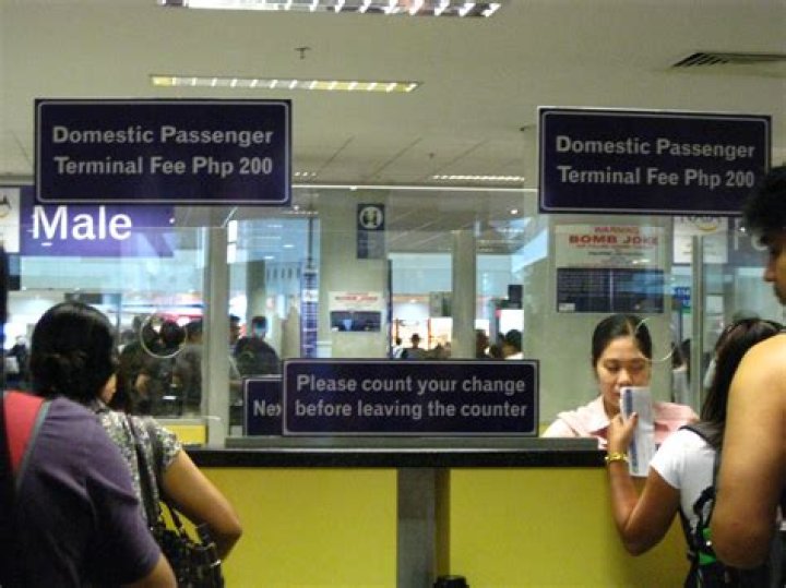 Do I need to pay travel tax and terminal fee in the Philippines?