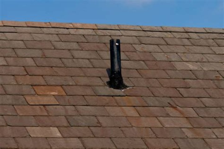 Does a plumbing vent pipe have to go through the roof?