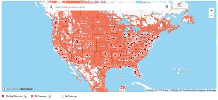 How do I check my AT cell phone coverage in my area?