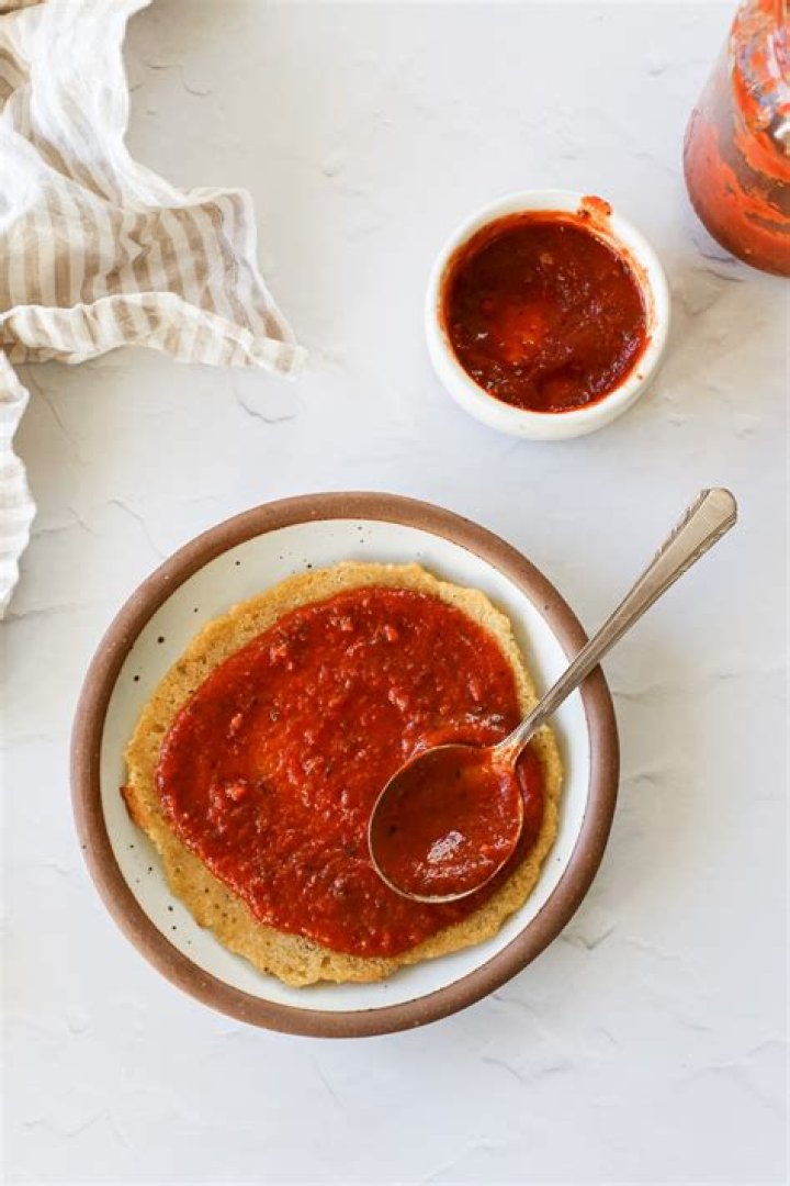 How do you add richness to tomato sauce?