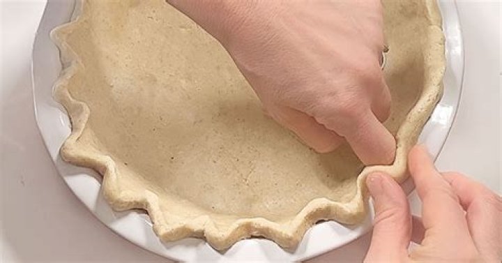 How do you flute the edges of a pie crust?