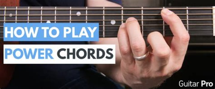How do you play power chords on an electric guitar?