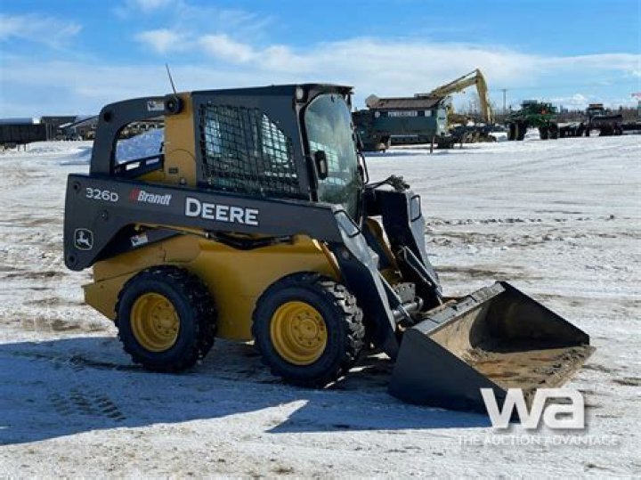 How much does a John Deere 326D skid steer weigh?