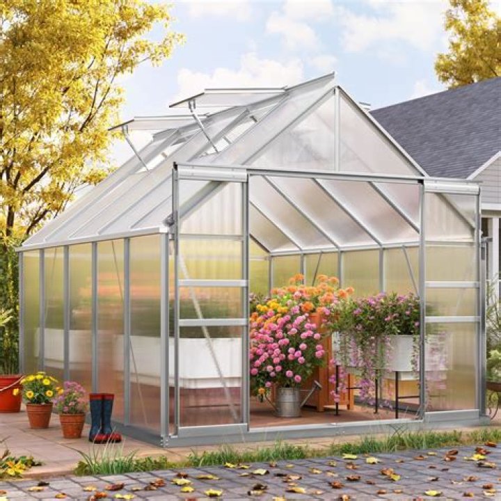 How much does a large glass greenhouse cost?