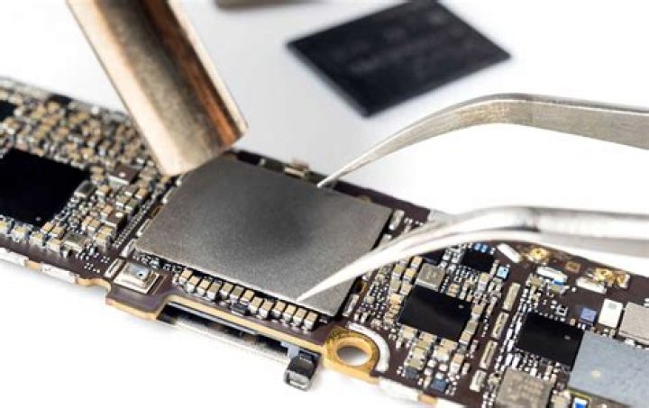 How much does Apple charge for logic board replacement?