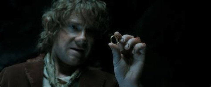 How old was Bilbo when he left the Shire?