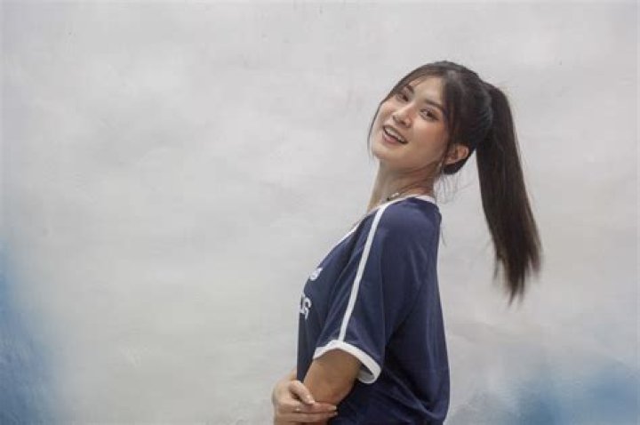 Is Elizabeth Tan Chinese or Malay?
