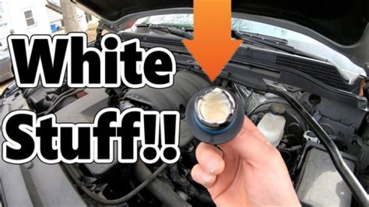 What does white stuff on oil cap mean?