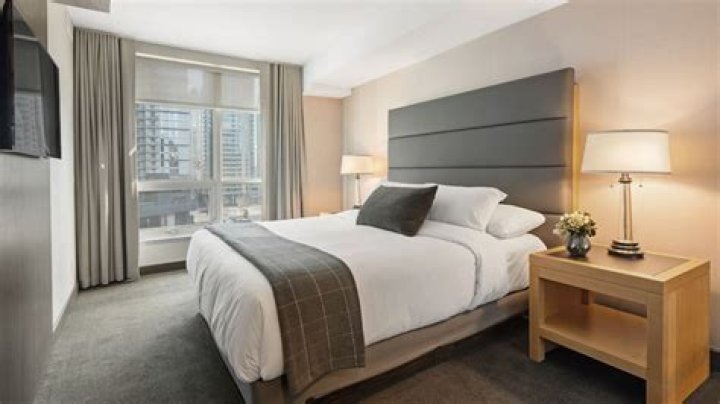 What is a hotel room with two rooms called?