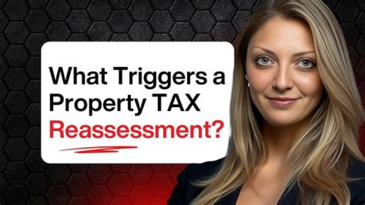 What triggers a property tax reassessment?
