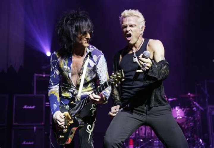 Who was the guitarist in rebel yell?