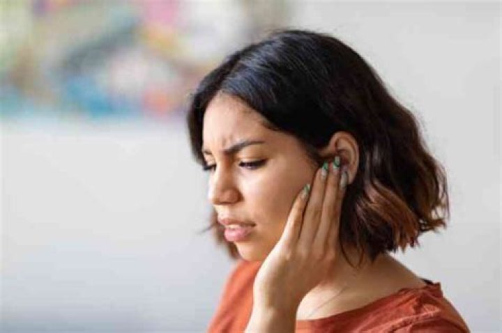 Why can I hear myself echo in my ear?