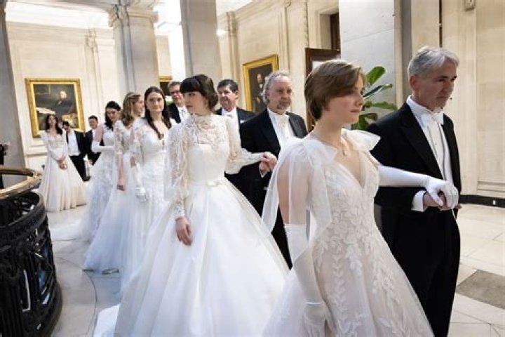 Why do debutantes wear white dresses?